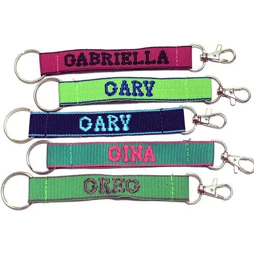 Wholesale Bundle of 100 - Embroidered Novelty Keychains - Nylon Key Strap & Clip (1" x 7.75") Assorted Names & Phrases