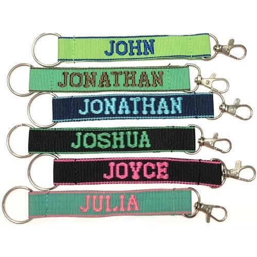 Wholesale Bundle of 100 - Embroidered Novelty Keychains - Nylon Key Strap & Clip (1" x 7.75") Assorted Names & Phrases