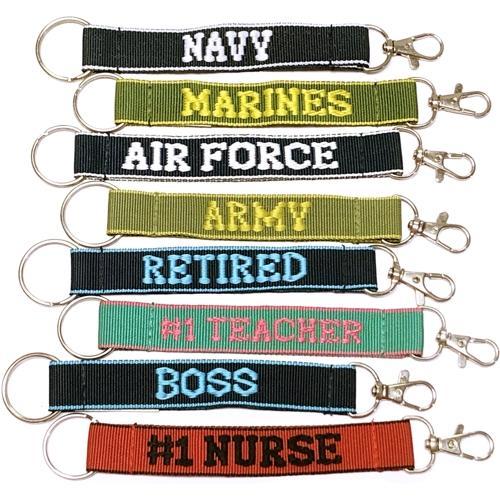 Wholesale Bundle of 100 - Embroidered Novelty Keychains - Nylon Key Strap & Clip (1" x 7.75") Assorted Names & Phrases