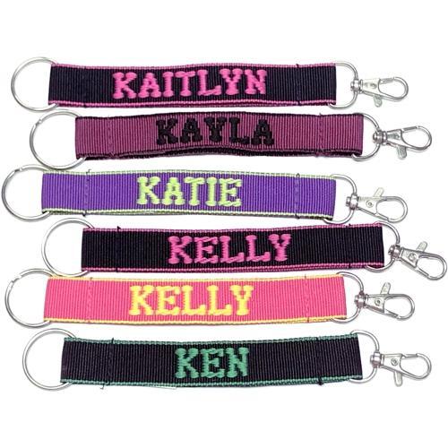 Wholesale Bundle of 100 - Embroidered Novelty Keychains - Nylon Key Strap & Clip (1" x 7.75") Assorted Names & Phrases