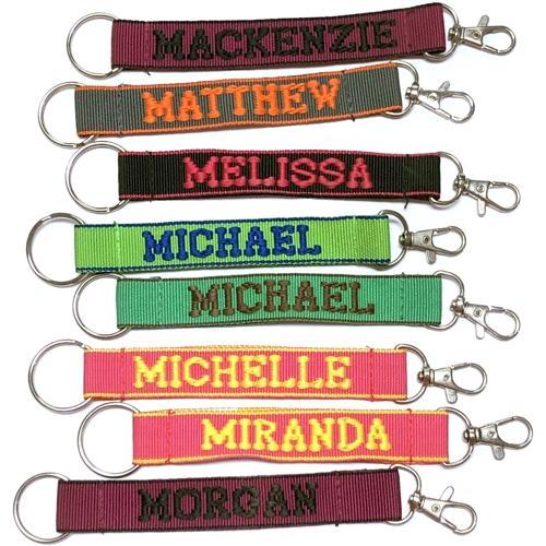 Wholesale Bundle of 100 - Embroidered Novelty Keychains - Nylon Key Strap & Clip (1" x 7.75") Assorted Names & Phrases