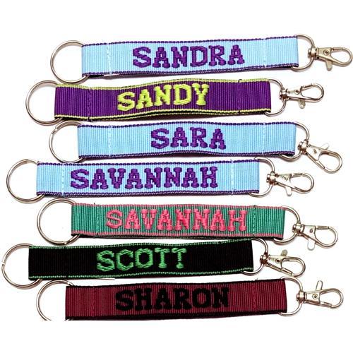 Wholesale Bundle of 100 - Embroidered Novelty Keychains - Nylon Key Strap & Clip (1" x 7.75") Assorted Names & Phrases