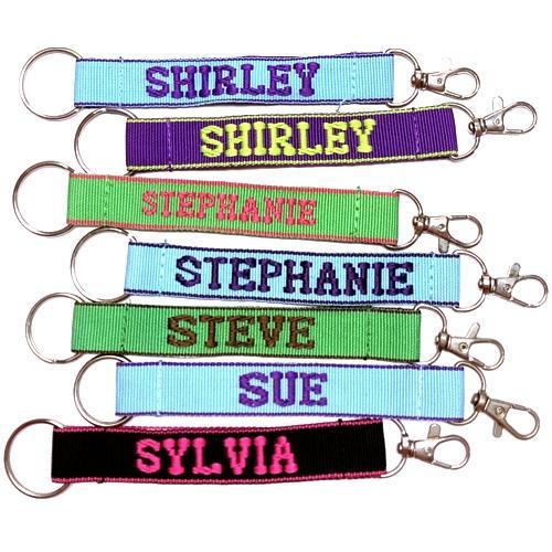 Wholesale Bundle of 100 - Embroidered Novelty Keychains - Nylon Key Strap & Clip (1" x 7.75") Assorted Names & Phrases